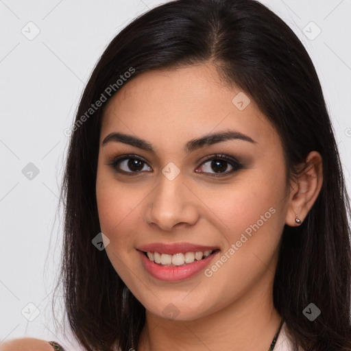 Joyful white young-adult female with long  brown hair and brown eyes