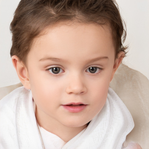 Neutral white child female with short  brown hair and brown eyes