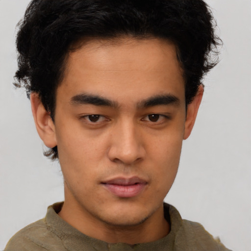 Neutral latino young-adult male with short  brown hair and brown eyes