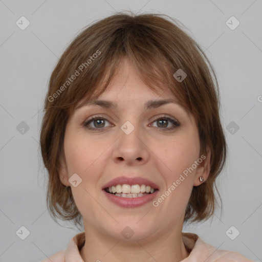 Joyful white young-adult female with medium  brown hair and grey eyes