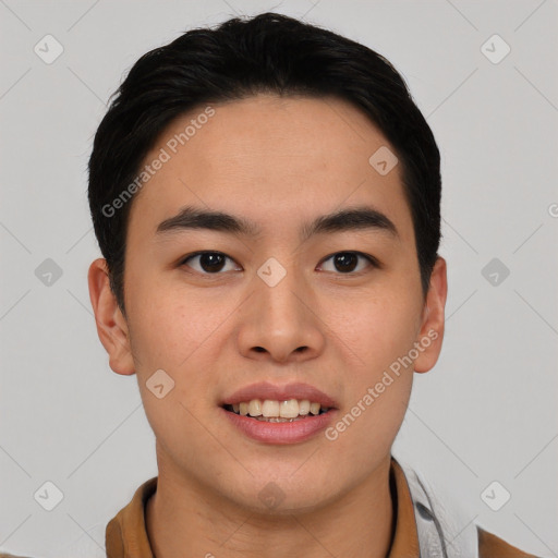 Joyful asian young-adult male with short  black hair and brown eyes