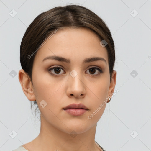 Neutral white young-adult female with medium  brown hair and brown eyes