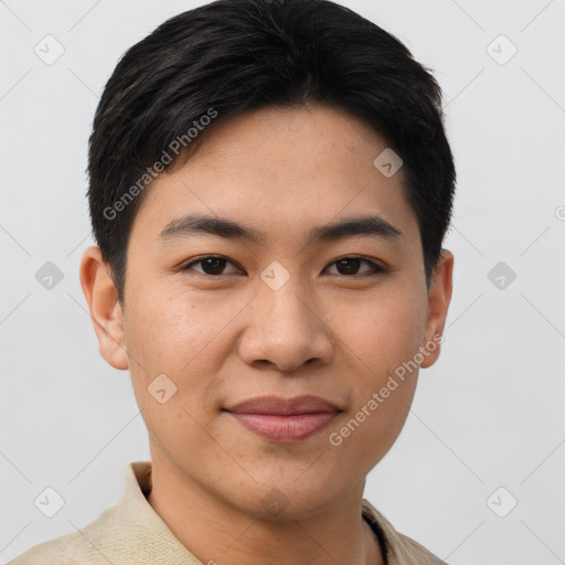 Joyful asian young-adult male with short  black hair and brown eyes