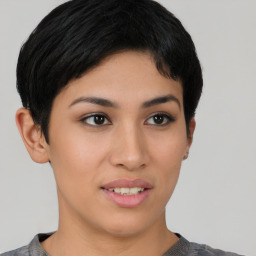 Joyful asian young-adult female with short  brown hair and brown eyes