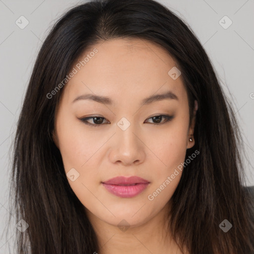 Joyful asian young-adult female with long  brown hair and brown eyes