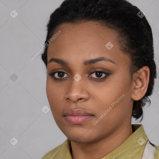 Neutral black young-adult female with medium  brown hair and brown eyes