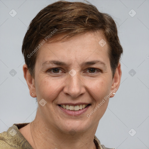 Joyful white adult female with short  brown hair and grey eyes