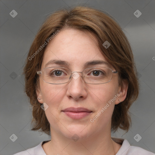 Joyful white adult female with medium  brown hair and grey eyes