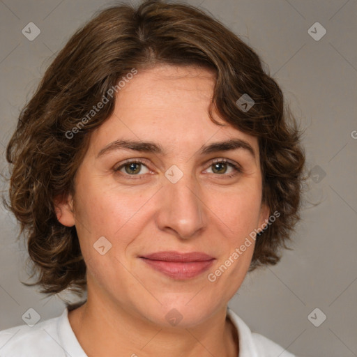 Joyful white young-adult female with medium  brown hair and green eyes