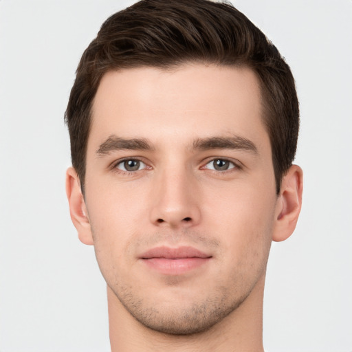 Neutral white young-adult male with short  brown hair and brown eyes