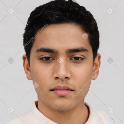 Neutral latino young-adult male with short  black hair and brown eyes