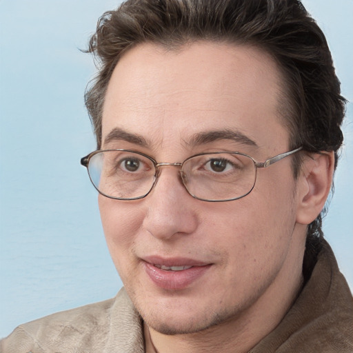 Joyful white adult male with short  brown hair and grey eyes