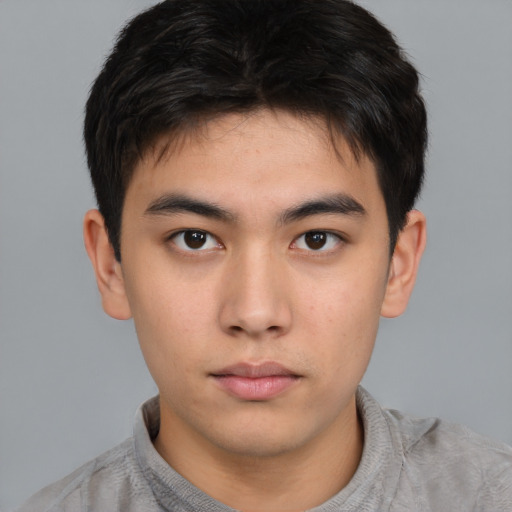 Neutral asian young-adult male with short  brown hair and brown eyes