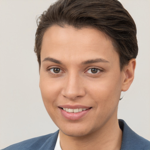 Joyful white young-adult female with short  brown hair and brown eyes