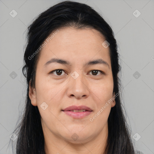 Joyful asian adult female with long  brown hair and brown eyes