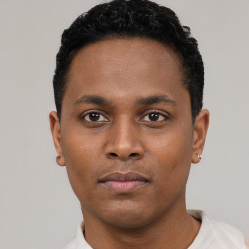 Neutral black young-adult male with short  black hair and brown eyes
