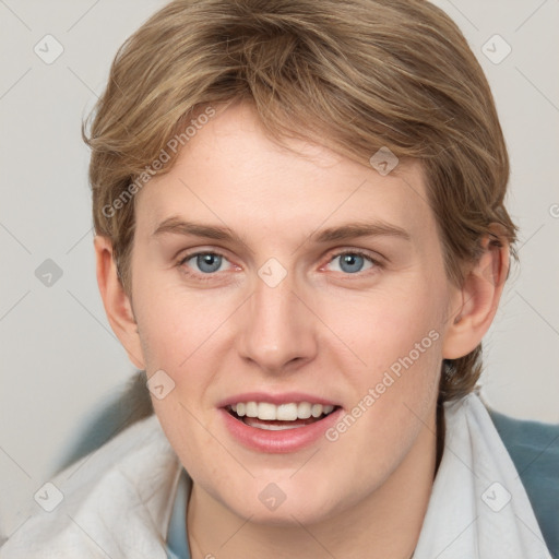 Joyful white young-adult female with medium  brown hair and blue eyes