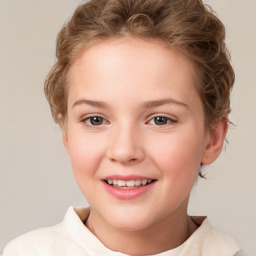 Joyful white child female with short  brown hair and brown eyes