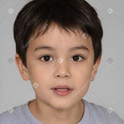 Joyful white child male with short  brown hair and brown eyes