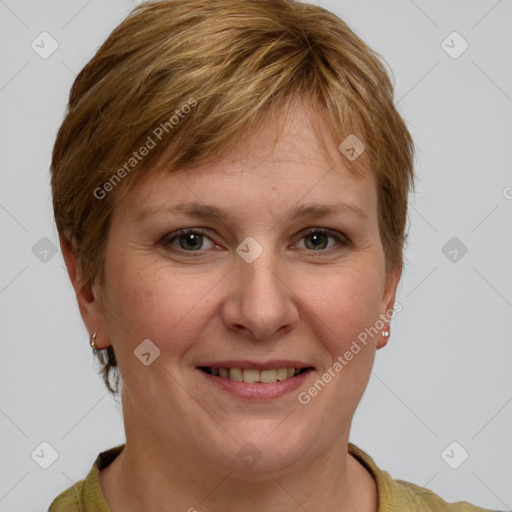 Joyful white adult female with short  brown hair and grey eyes