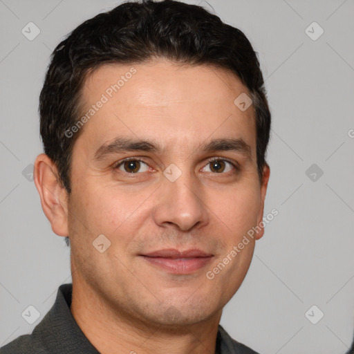 Joyful white adult male with short  brown hair and brown eyes