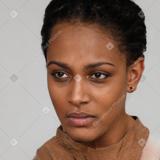 Neutral black young-adult female with short  brown hair and brown eyes