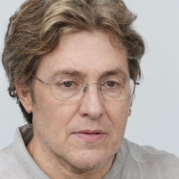 Joyful white middle-aged male with short  brown hair and brown eyes