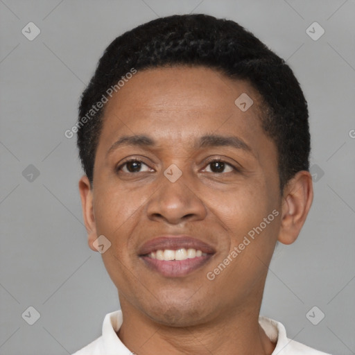 Joyful latino adult male with short  black hair and brown eyes