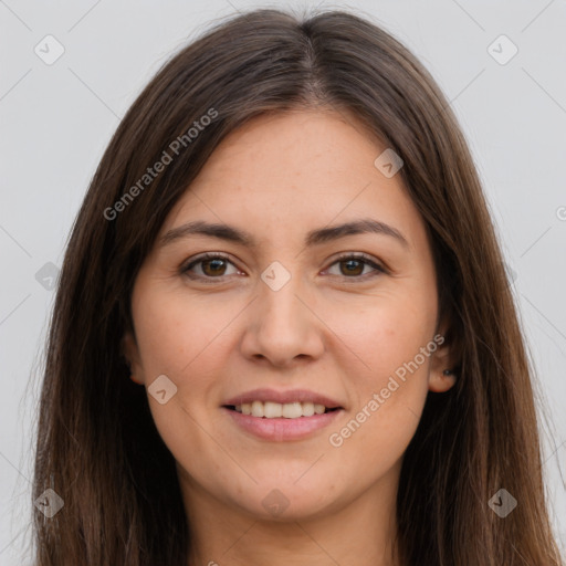 Joyful white young-adult female with long  brown hair and brown eyes