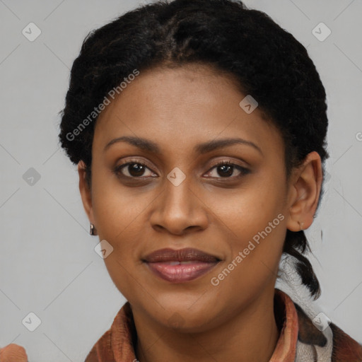 Joyful black young-adult female with medium  brown hair and brown eyes