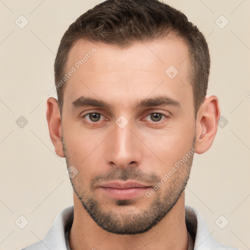 Neutral white young-adult male with short  brown hair and brown eyes