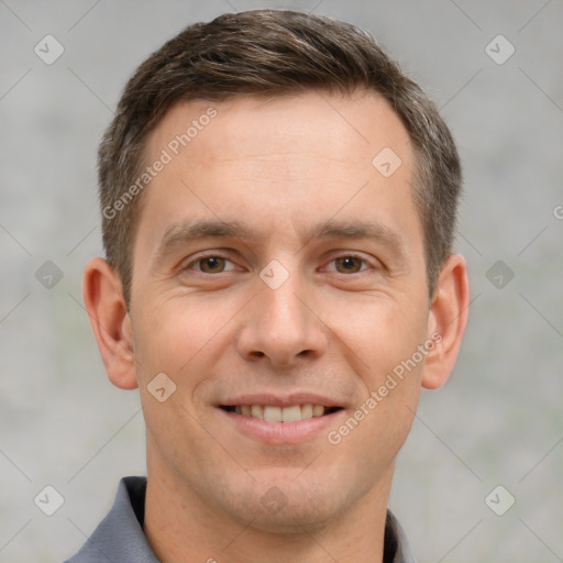 Joyful white adult male with short  brown hair and brown eyes