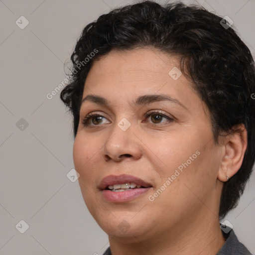 Joyful white adult female with short  brown hair and brown eyes