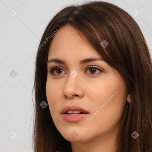 Neutral white young-adult female with long  brown hair and brown eyes