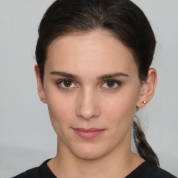 Neutral white young-adult female with short  brown hair and brown eyes