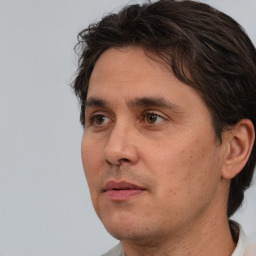 Neutral white adult male with short  brown hair and brown eyes