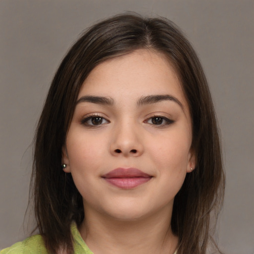 Joyful white young-adult female with medium  brown hair and brown eyes