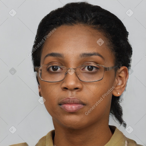 Neutral black young-adult female with short  black hair and brown eyes