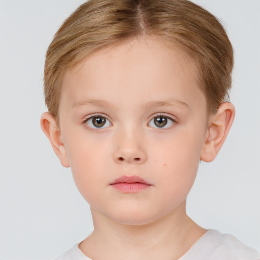 Neutral white child female with short  brown hair and brown eyes