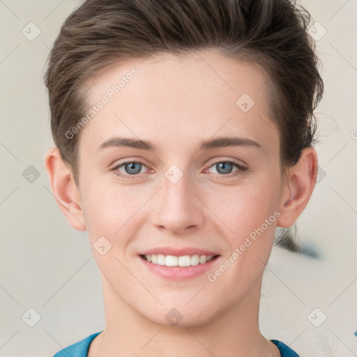 Joyful white young-adult female with short  brown hair and grey eyes