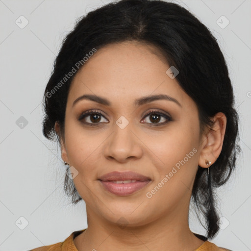 Joyful latino young-adult female with medium  brown hair and brown eyes