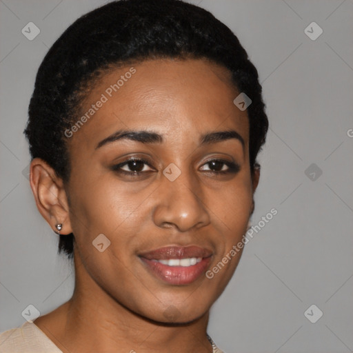 Joyful black young-adult female with short  brown hair and brown eyes