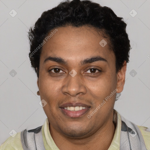 Joyful black young-adult male with short  black hair and brown eyes
