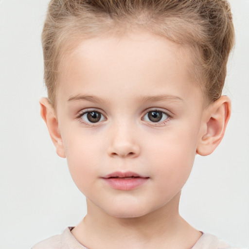 Neutral white child female with short  brown hair and brown eyes