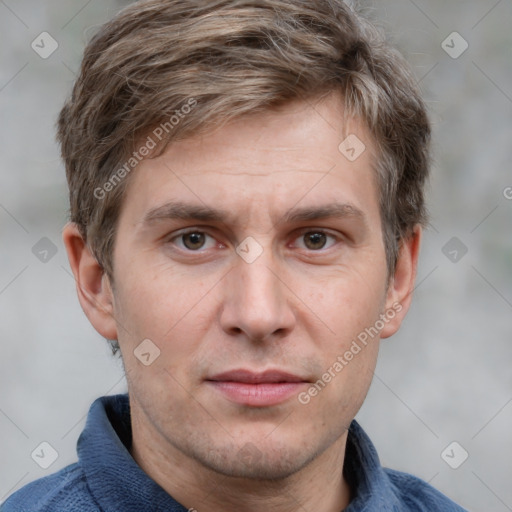 Joyful white adult male with short  brown hair and grey eyes