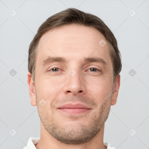 Neutral white adult male with short  brown hair and grey eyes