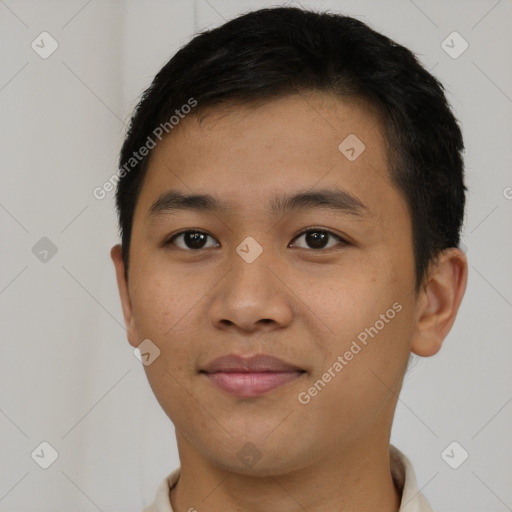 Joyful asian young-adult male with short  brown hair and brown eyes