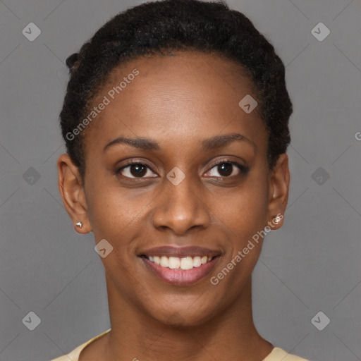 Joyful black young-adult female with short  brown hair and brown eyes