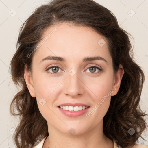 Joyful white young-adult female with medium  brown hair and green eyes