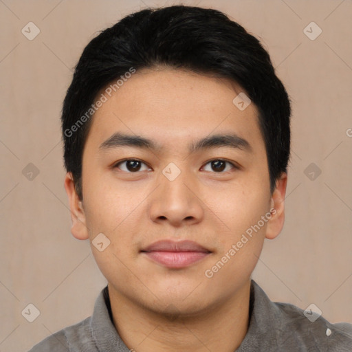 Joyful asian young-adult male with short  black hair and brown eyes